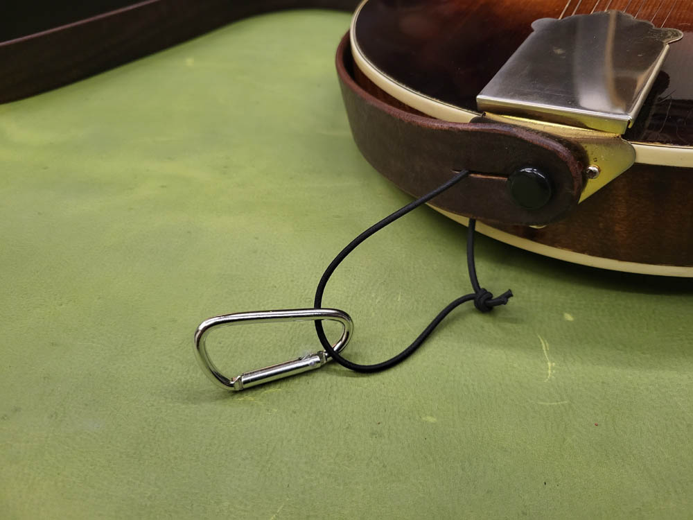Solving the mandolin neck drop problem