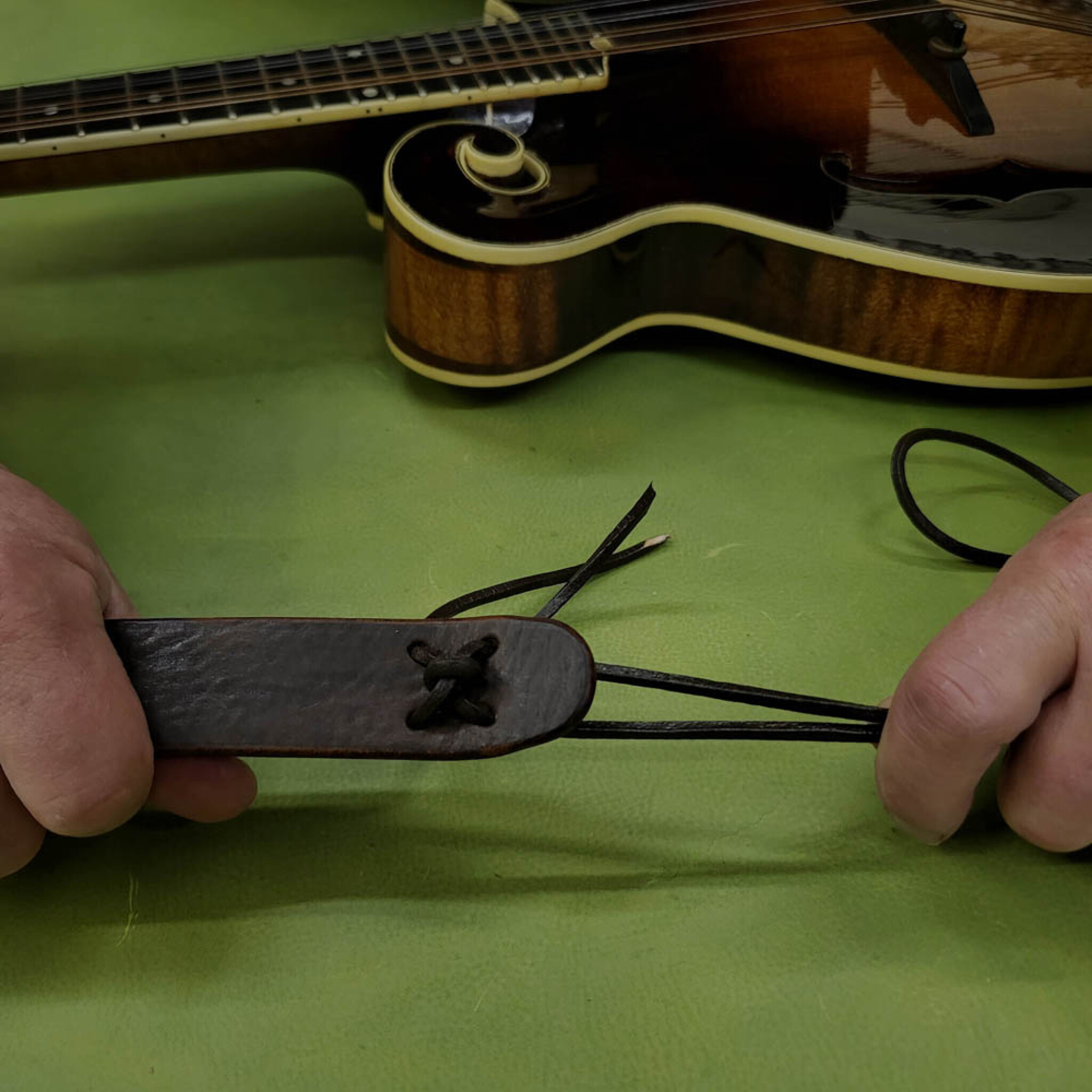 slipping cord on mandolin strap FIXED